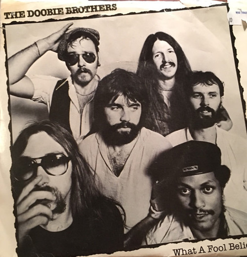 The Doobie Brothers - What A Fool Believes / Don't Stop To Watch The Wheels (7", Styrene, PRC)