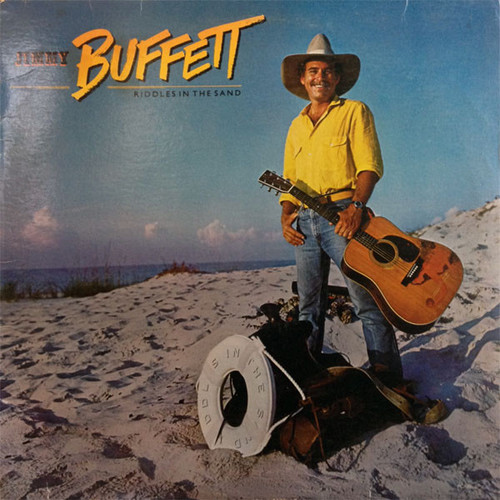 Jimmy Buffett - Riddles In The Sand (LP, Album, Glo)