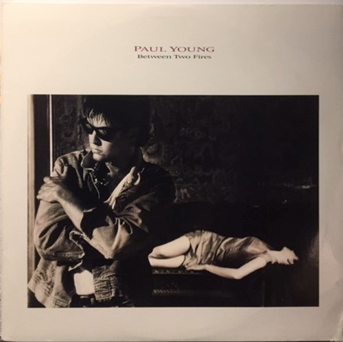 Paul Young - Between Two Fires (LP, Album, Promo)