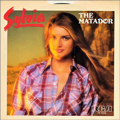 Sylvia (7) - The Matador / Cry Baby Cry (7", Single)