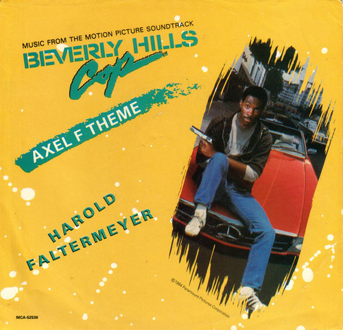 Harold Faltermeyer - Axel F Theme (7", Single, Glo)