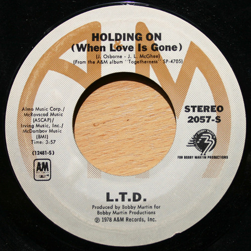 L.T.D. - Holding On (When Love Is Gone) (7", Styrene, Pit)