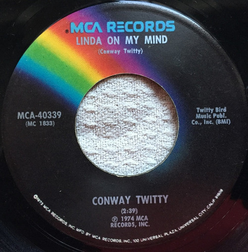 Conway Twitty - Linda On My Mind / She's Just Not Over You Yet (7", Single, Glo)