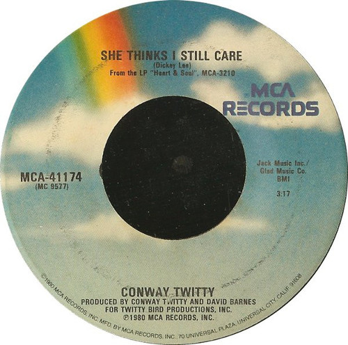 Conway Twitty - She Thinks I Still Care (7", Single, Glo)