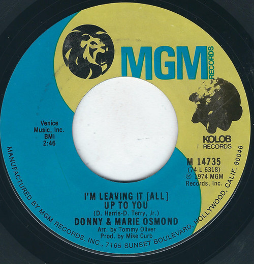 Donny And Marie Osmond* - I'm Leaving It (All) Up To You / The Umbrella Song (7", Single, Mono, Styrene, All)