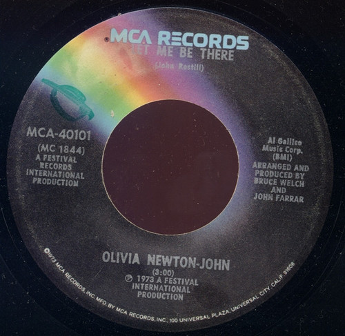Olivia Newton-John - Let Me Be There (7", Single, Glo)