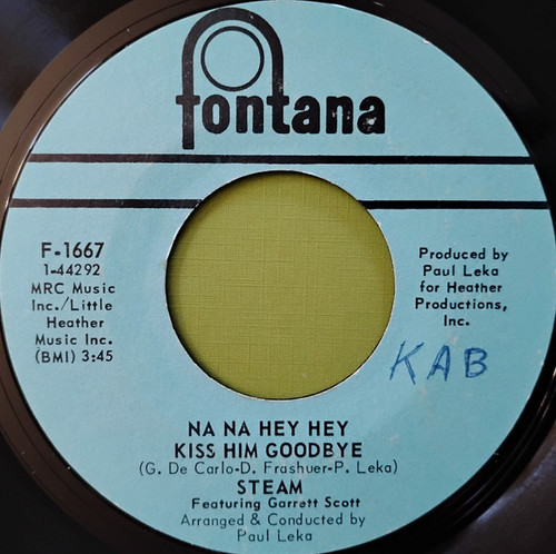 Steam Featuring Garrett Scott - Na Na Hey Hey Kiss Him Goodbye / It's The Magic In You Girl (7", Single, Styrene, Mer)