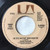 Tommy Cash - I'm Just Getting By /  She Still Has That Look In Her Eyes  (7")