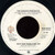 The Doobie Brothers - Keep This Train A-Rollin' (7")