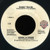 Randy Travis - Diggin' Up Bones (7", Single, Spe)