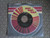 Earl Thomas Conley - Holding Her And Loving You (7", Ind)
