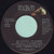 Earl Thomas Conley - We Believe In Happy Endings (7", Single)