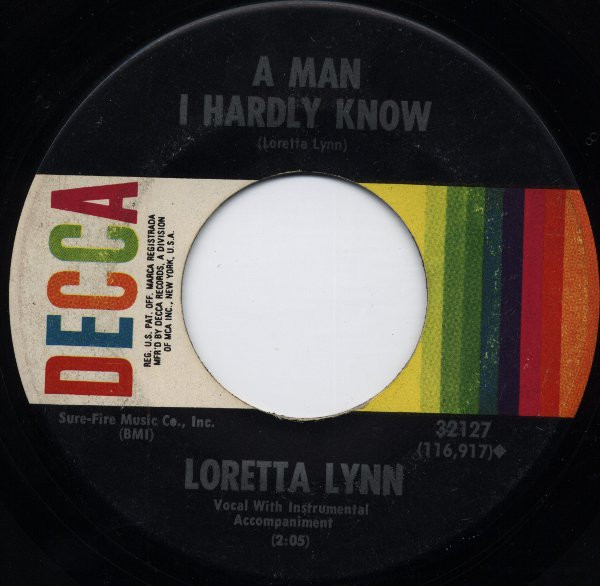 Loretta Lynn - A Man I Hardly Know (7", Single, Pin)