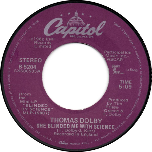 Thomas Dolby - She Blinded Me With Science / Flying North - Capitol Records, Venice In Peril Records - B-5204, 12 R6051 - 7", Win 1041473338