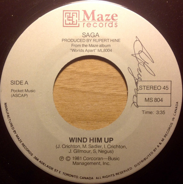 Saga (3) - Wind Him Up (7", Single)