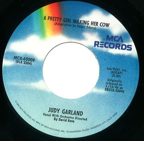 Judy Garland - A Pretty Girl Milking Her Cow / It's A Great Day For The Irish (7", Single, RE, Pin)
