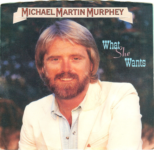 Michael Martin Murphey - What She Wants - EMI America - B-8243 - 7", Single, Jac 1094309460