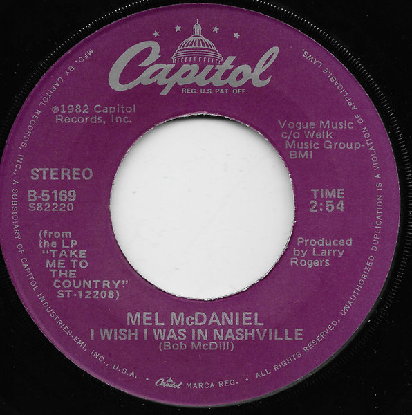 Mel McDaniel - I Wish I Was In Nashville (7", Single)