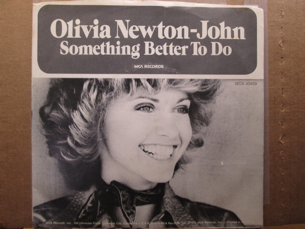 Olivia Newton-John - Something Better To Do / He's My Rock (7", Single, Glo)