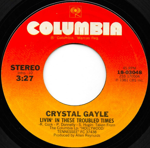 Crystal Gayle - Livin' In These Troubled Times (7", Styrene, Pit)