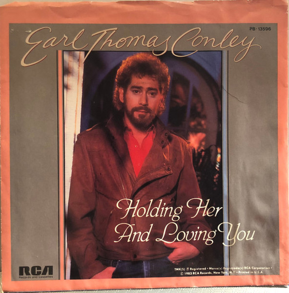 Earl Thomas Conley - Holding Her And Loving You (7", Ind)