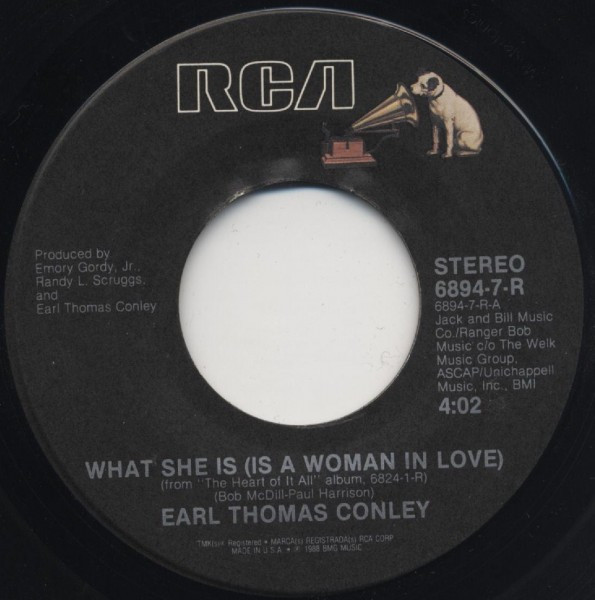 Earl Thomas Conley - What She Is (Is A Woman In Love) (7")