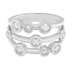 An image of a Rachel Koen brand women's ring with diamonds, presented in a close-up, front-facing view against a white background. The ring features multiple round-cut diamonds, bezel-set in a polished white gold triple-band design, with the diamonds spaced evenly across the bands. The image is taken from a slight top angle, highlighting the brilliance and arrangement of the diamonds. The ring occupies the central portion of the frame, providing a clear view of its intricate design.