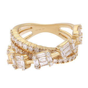 An image of a luxurious Rachel Koen women's ring with diamonds, captured in a close-up side view against a white background. The ring features an intricate design with multiple rows of small round diamonds and larger baguette diamonds set in a polished yellow gold band. The band has a unique, open design with a stamp indicating '14K 750 PF' visible on the inner side, suggesting the purity of the gold used. The diamonds are positioned at various angles, catching light and emphasizing the ring's sparkle and detailed craftsmanship.