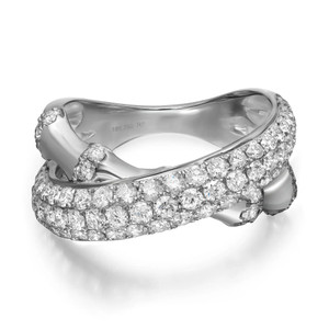 An image of a Rachel Koen women's ring with diamonds, showcased at a close-up angle to emphasize the sparkle and detail of the stones. The ring is captured from a slightly elevated perspective, highlighting the encrusted round cut diamonds that adorn the white gold band, which curves gently to reveal the interior hallmark '18K 750.' The light reflects off the diamonds and polished metal, showcasing the ring's luxurious design and craftsmanship.