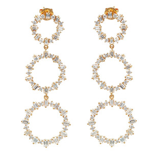 An image of a pair of Rachel Koen brand long drop earrings for women, featuring diamonds. The earrings are displayed frontally at a medium distance, allowing clear visibility of their design and details. Each earring consists of three concentric yellow gold circles adorned with multiple baguette and round-cut diamonds, connected vertically by a gold link. The earrings have a post backing visible at the top of the design. The image shows the earrings positioned parallel to each other, with a symmetrical and straight-on angle that highlights their elegance and intricate craftsmanship.