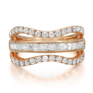 An image of a Rachel Koen women's ring with diamonds, displayed at a close-up angle to highlight the intricate details. The ring features a unique intertwined design with bands of rose gold, and is adorned with sparkling round and baguette-cut diamonds. The diamonds are set in a way that maximizes their brilliance, with the bands positioned slightly off-center to create a dynamic and elegant look. The image is taken from a front-facing perspective, allowing a clear view of the ring's structure and the shimmering stones.