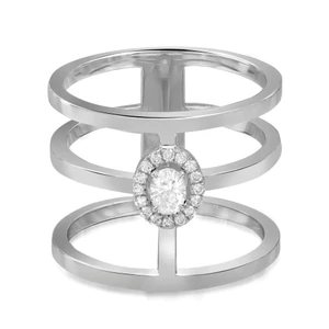 An image of a Messika women's Glam'Azone 3 row diamond band ring, positioned centrally and viewed from a frontal angle at a close distance. The ring features a unique triple-band design with the top band showcasing a prominent central diamond encircled by smaller diamonds, creating a halo effect. The metal appears polished 18k white gold, and the ring is set against a white background to highlight its intricate details and sparkle.