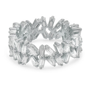 An image of a luxurious Rachel Koen women's ring with diamonds, captured in a close-up view against a white background. The ring features an intricate design with multiple baguette cut diamonds, meticulously set in a polished white gold band. The diamonds are positioned at different angles, creating a sparkling and dynamic appearance as they catch the light. The perspective of the photo provides a clear view of the ring's top and side details, emphasizing the quality and craftsmanship of the piece.