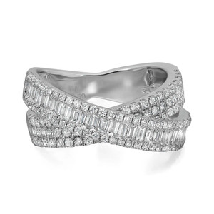 An image of a Rachel Koen brand ring with diamonds for women, shown in close-up with a slightly angled side view to highlight the intricate design. The ring features a band that twists elegantly, encrusted with multiple rows of sparkling round and baguette cut diamonds. The diamonds are set in a polished white gold metal, with the light reflecting off both the stones and metal for a luxurious appearance.