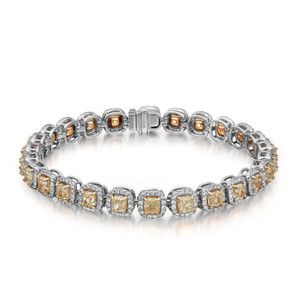 An image of a Rachel Koen unisex adult bracelet with diamonds, displayed at a front-facing angle on a neutral background. The bracelet features a series of square-shaped links, each encasing a central yellow diamond surrounded by smaller white diamonds in halo setting, set in white gold. The bracelet forms a slight curve, with the clasp visible and securely fastened, giving a clear view of its intricate design from a medium distance.