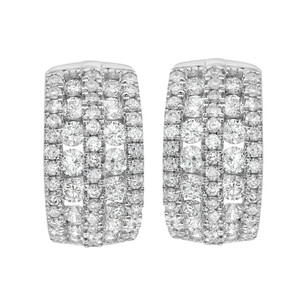 An image of a pair of Rachel Koen brand huggie earrings for women, featuring multiple rows of round cut sparkling diamonds in white gold. The earrings are displayed frontally, at a close distance and a direct angle, providing a clear view of their intricate design and luxurious shine.