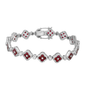 An image of a Rachel Koen women's bracelet with diamonds and ruby gemstones laid out straight on a neutral background. The bracelet is captured from a top-down angle, providing a clear view of its intricate design. Round cut rubies appear as red inlays surrounded by sparkling diamonds set within white gold links. The clasp is visible and secured, with the brand name inscribed at the center. The image is taken from a close distance, showing the details of the gemstones and the reflective quality of the diamonds.
