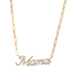An image of a Rachel Koen women's necklace with diamonds, featuring a yellow gold paperclip chain and the word "Mama" adorned with sparkling round cut diamonds. The necklace is displayed against a white background, with a frontal view showcasing the cursive "Mama" pendant in the center. The paperclip chain is angled slightly to the left, with the pendant's top portion closer to the viewer, creating a sense of depth. The image is taken from a medium distance, allowing clear visibility of the pendant's details and the chain's links.