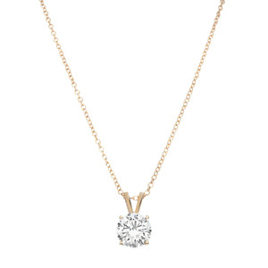 An image of a Rachel Koen women's necklace with lab grown diamonds, displayed against a white background. The necklace features a delicate yellow gold chain with a single, large round-cut diamond pendant in a four-prong setting. The pendant hangs centrally and is positioned at a straight-on angle relative to the viewer, providing a clear view of the diamond's facets. The chain extends symmetrically on both sides, leading up to the top edges of the frame with the necklace appearing to be at a medium distance from the viewer.