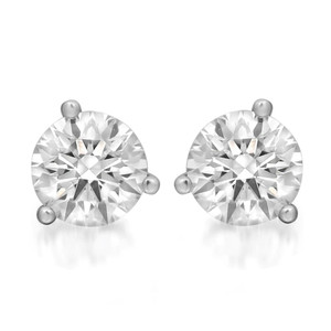 An image of a pair of Rachel Koen women's earrings with lab grown diamonds, showcasing two round-cut stones prominently set in a three prong setting in white gold. The earrings are displayed head-on at a close distance, with a neutral white background that accentuates their brilliance and clarity. The angle of the image provides a clear view of the diamond's facets and the polished metal surrounding each stone.
