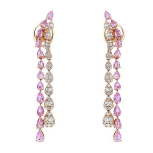 An image of a pair of Rachel Koen women's earrings, displayed against a white background. The earrings feature a vertical long drop design with alternating diamonds and pink sapphire gemstones, all set in a yellow gold framework. The diamonds are cut in a mix of shapes, providing a contrast to the teardrop-shaped pink sapphire gemstones. The earrings are shown from a front-facing angle, with both pieces positioned parallel to each other and centered in the frame, providing a clear view of their intricate detailing and luxurious appearance.
