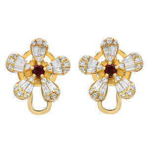 An image of a pair of Rachel Koen women's stud earrings featuring a floral design with diamonds and ruby gemstones. The earrings are shown front-facing, positioned centrally, and at a close distance to offer a clear view of the intricate details. The yellow gold setting enhances the brilliance of the multiple diamonds and the central red gemstone in each earring.