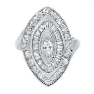An image of a Rachel Koen women's cocktail ring with diamonds, displayed at a close-up angle that highlights the intricate details of the setting. The ring is centered in the frame, with a large, marquise-cut diamond at its core, encircled by two concentric halos of smaller round and baguette-cut diamonds, all set in a polished white gold band. The image captures the ring from a top-down view, showcasing the sparkle and design of the diamonds set at varying angles to enhance their brilliance.