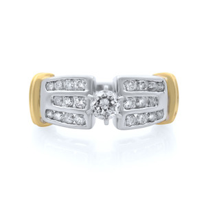 An image of a Rachel Koen women's ring with diamonds, displayed in a front-facing view against a white background. The ring features a central round-cut diamond set in prongs, flanked by two bands of channel-set round cut diamonds, creating a symmetrical design. The band combines yellow and white gold elements, with the yellow gold visible on the outer edges and white gold surrounding the diamonds. The image is taken from a close-up perspective, highlighting the sparkle and details of the stones and the metal's polished finish. The ring is pre-owned in a good condition. 
