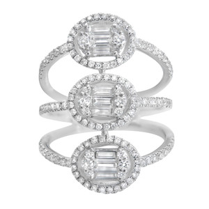 An image of a Rachel Koen women's cocktail ring with diamonds showcased from a front-facing angle with a close-up view. The ring features three vertically aligned bands, each with a central emerald-cut diamond surrounded by a halo of smaller round brilliant-cut diamonds. The bands are positioned in a slightly overlapping manner, creating a sense of continuity and elegance. The diamonds are set in a polished white gold metal, and the sparkling stones are clearly visible against the neutral background.