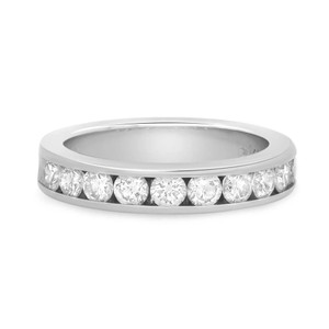 An image of a Rachel Koen women's wedding band ring with diamonds, positioned centrally and viewed from a slightly elevated angle, showcasing a full, unobstructed view of the band and the row of round-cut diamonds encircling it. The image is a close-up, providing a clear view of the ring's details against a white background. The ring is pre-owned in a great condition. 