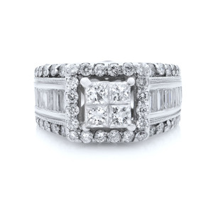 An image of a Rachel Koen women's engagement ring with diamonds, showcasing a central princess cut setting with multiple diamonds closely packed together, flanked by white gold bands of smaller round diamonds and baguette-cut diamonds on a white background. The ring is viewed from a front-facing angle at a close distance, providing a clear view of the intricate design and sparkling stones.