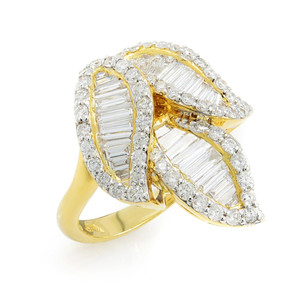 An image of a Rachel Koen women's ring with diamonds, shown in close-up with a focus on the intricate details. The ring features a unique leaf-like design with multiple diamond-encrusted elements, set in yellow gold. The diamonds are arranged in parallel lines within the leaf shapes, and the band of the ring is visible at the bottom of the frame, solid and polished. The ring is positioned at a slight angle to showcase the sparkle of the diamonds and the overall design of the piece.
