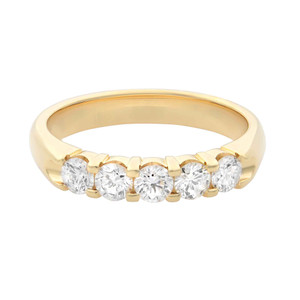 An image of a Rachel Koen women's wedding ring with diamonds, showcased in a close-up front view. The ring features a polished yellow gold band with a row of round, brilliant-cut diamonds securely held in prong settings. The angle of the photo provides a clear view of the diamonds' facets and the ring's profile. 