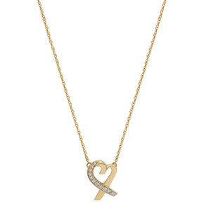 An image of a Tiffany & Co women's necklace with diamonds displayed at a straight-on angle against a white background. The necklace features a delicate yellow gold chain with a polished finish, leading to a heart-shaped ribbon pendant, part of which is embellished with small, sparkling round cut diamonds. The pendant is centered and shown at a close distance, providing a clear view of its intricate design and the diamonds' placement.